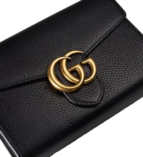 how much does a gucci wallet cost in singapore